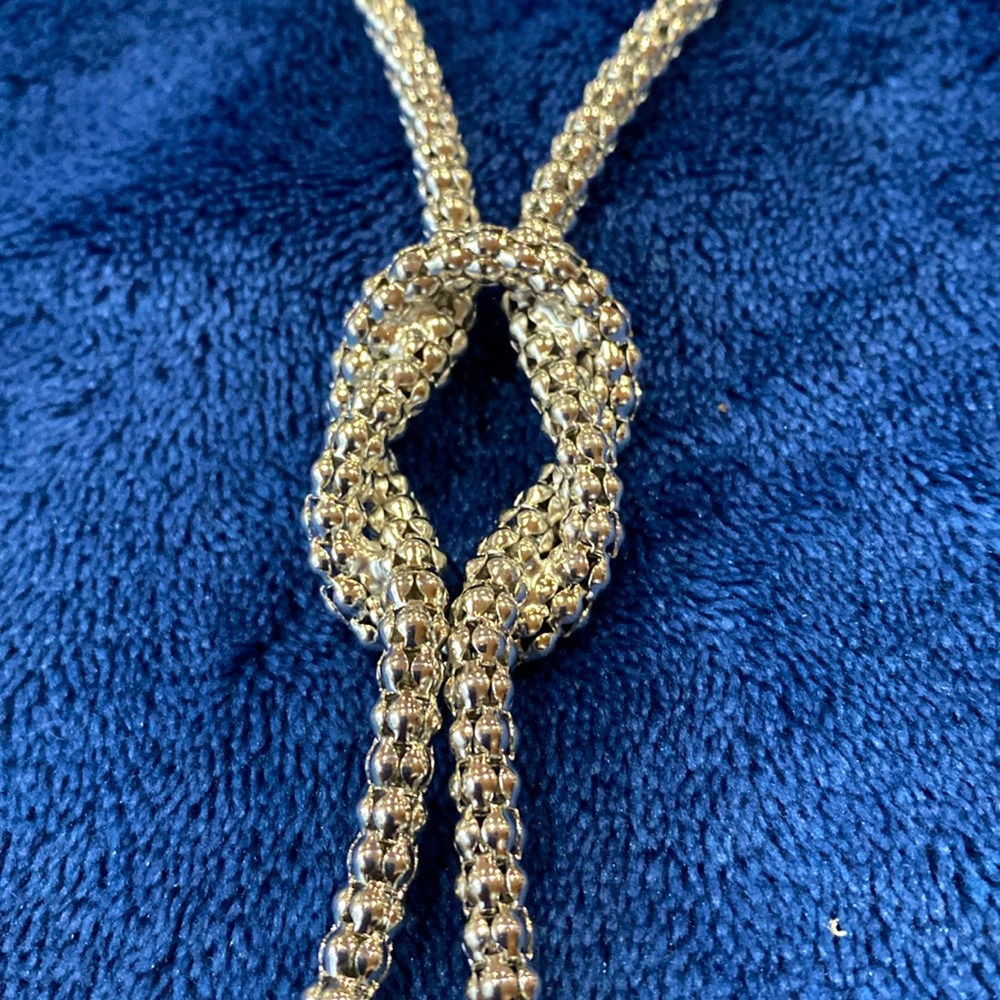 Mesh love knot necklace. EUC. Slips over the head or with lobster claw closures